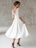 Satin V-neck A Line Tea-length Wedding Dress with Ruching and Sash - Curvevia