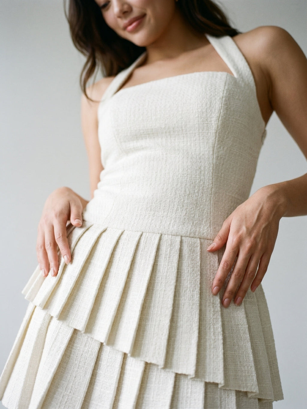 Ivory Stretch Knit A-Line Halter Neckline Side Zip Mini Homecoming Dress with Pleats - Curvevia