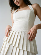 Ivory Stretch Knit A-Line Halter Neckline Side Zip Mini Homecoming Dress with Pleats - Curvevia
