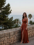 Rust Satin A-Line Halter Backless Floor-Length Bridesmaid Dress with Pleated Details - Curvevia