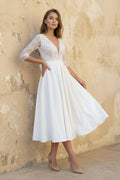 Satin V-neck A Line Tea-length Wedding Dress with Ruching and Sash - Curvevia