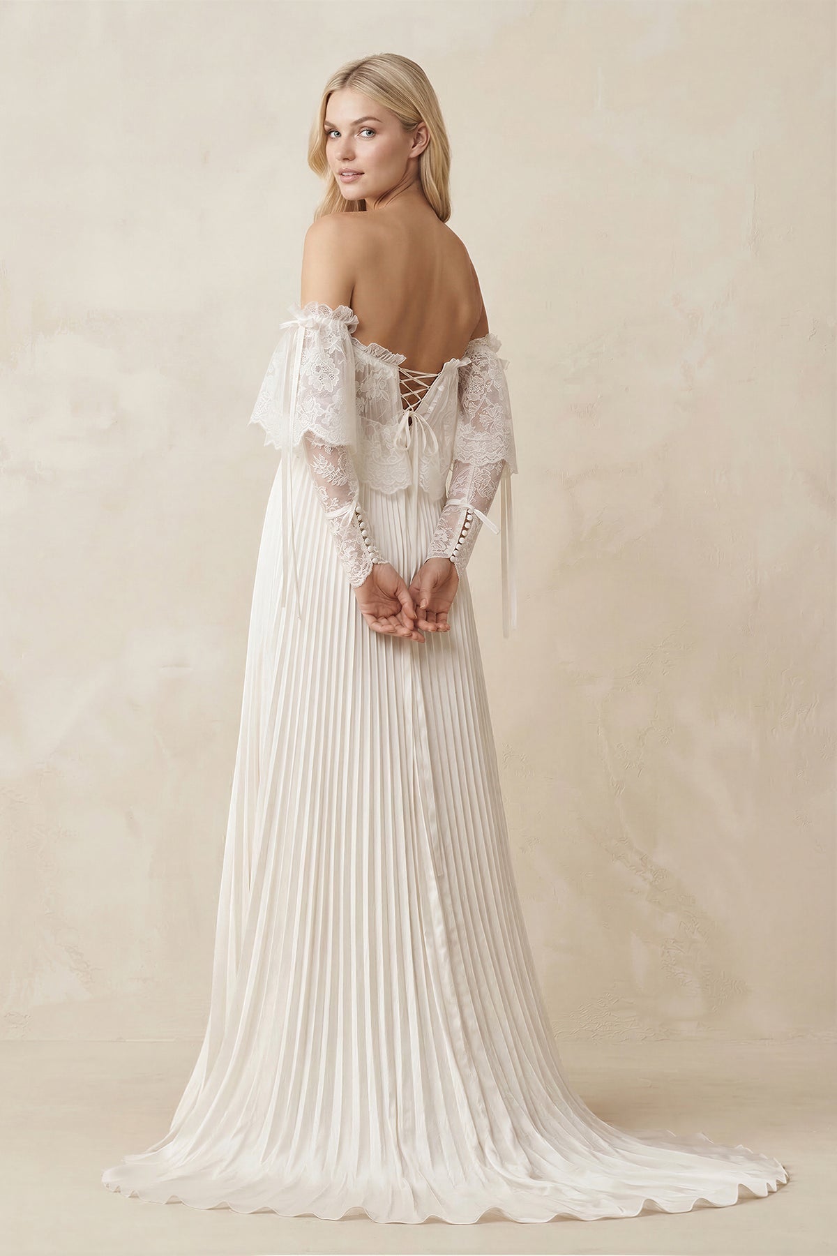 Off-the-Shoulder A-Line Pleated Appliqued Wedding Dress with Bow in Ivory - Curvevia