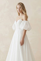Off-the-Shoulder A-Line Tulle Wedding Dress With Puff Sleeves in White - Curvevia