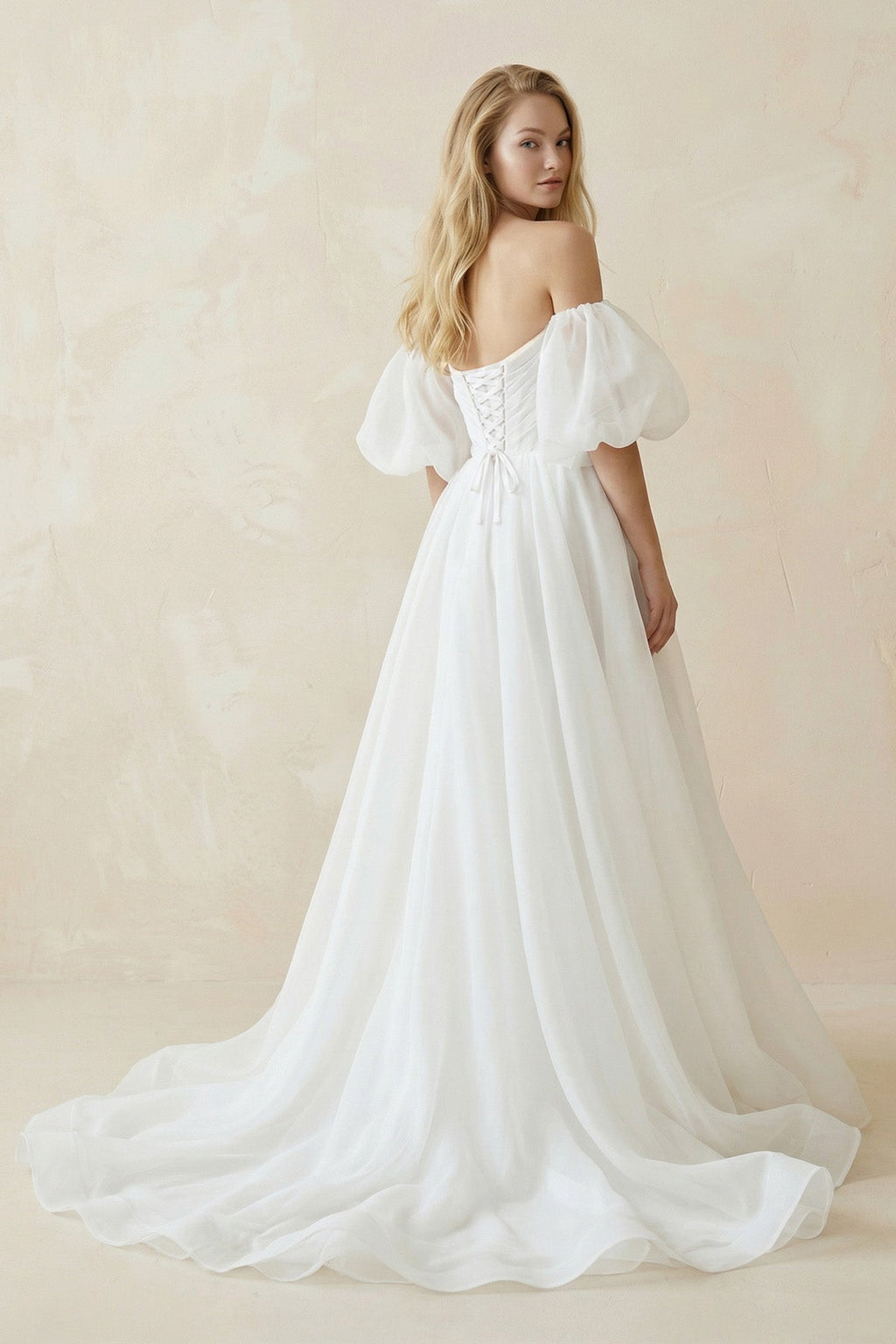 Off-the-Shoulder A-Line Tulle Wedding Dress With Puff Sleeves in White - Curvevia