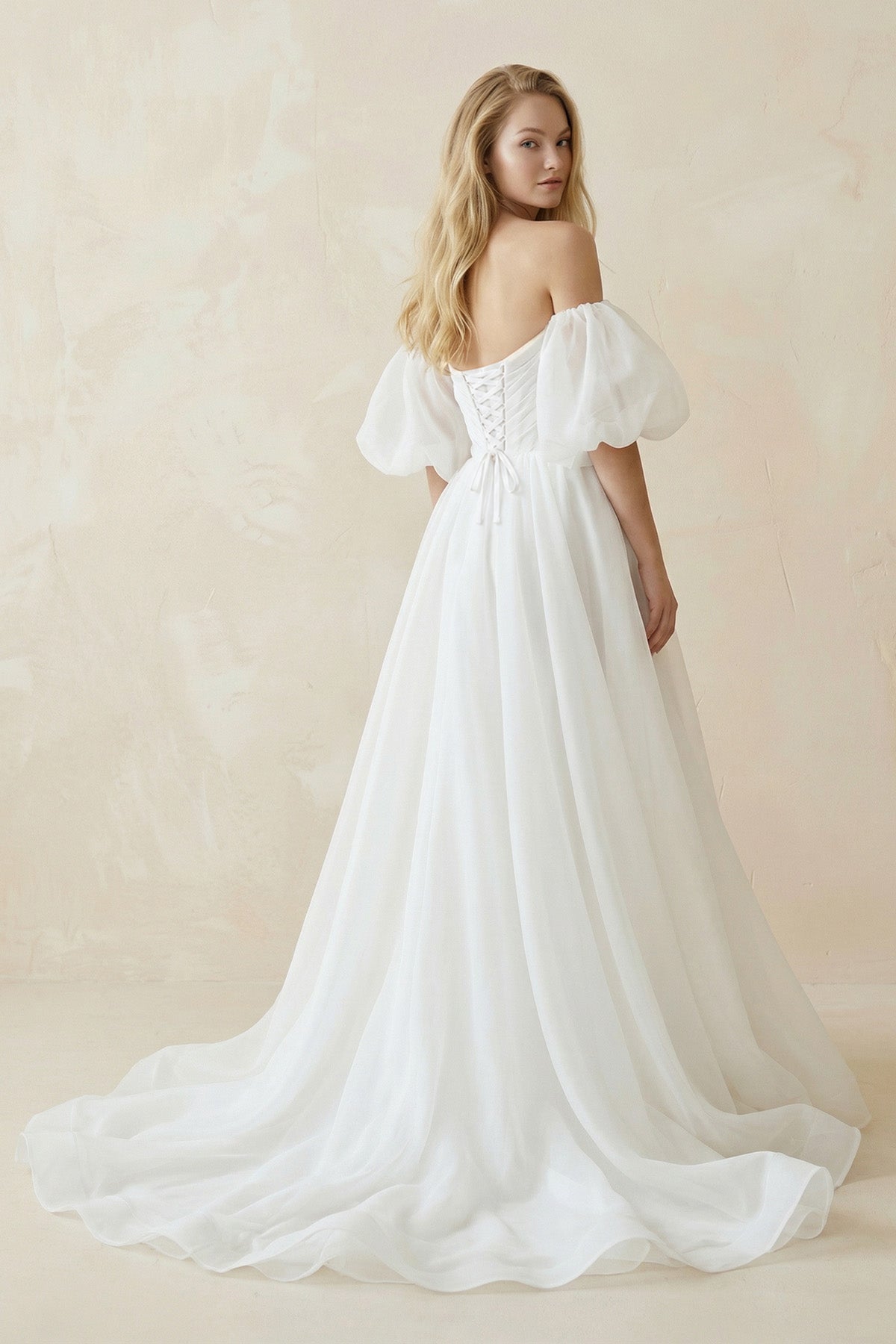 Off-the-Shoulder A-Line Tulle Wedding Dress With Puff Sleeves in White - Curvevia
