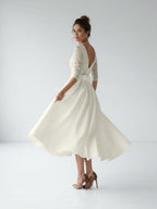 Satin V-neck A Line Tea-length Wedding Dress with Ruching and Sash - Curvevia